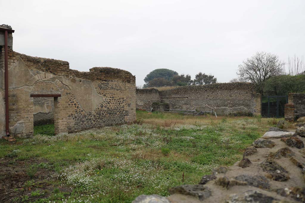 II.4.8 Pompeii. December 2018. Looking north-east across garden area, with II.4.8 entrance on right. Photo courtesy of Aude Durand.