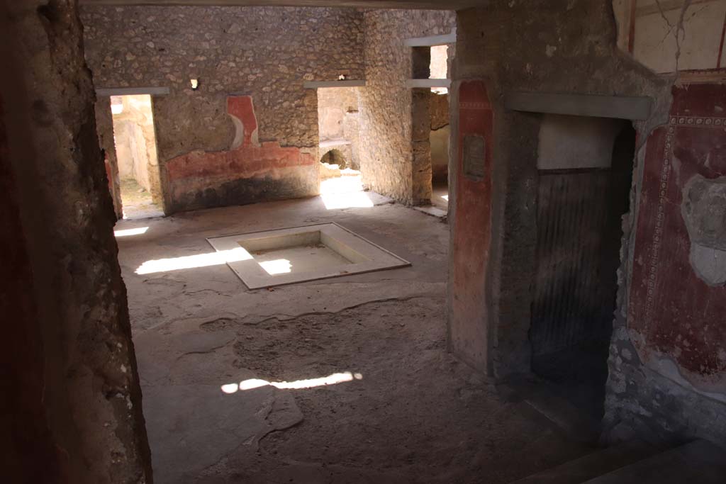 II.4.10 Pompeii. September 2019. Looking towards south-west corner of atrium, and west side.
Photo courtesy of Klaus Heese.