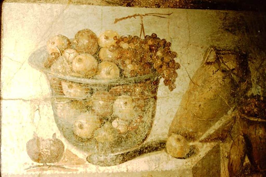 II.4.10 Pompeii. 1957. Frieze from north wall of tablinum, crater of glass full of fruits, and terracotta pots, Now in Naples Archaeological Museum. Inventory number 8611.
Photo by Stanley A. Jashemski.
Source: The Wilhelmina and Stanley A. Jashemski archive in the University of Maryland Library, Special Collections (See collection page) and made available under the Creative Commons Attribution-Non Commercial License v.4. See Licence and use details. J57f0550