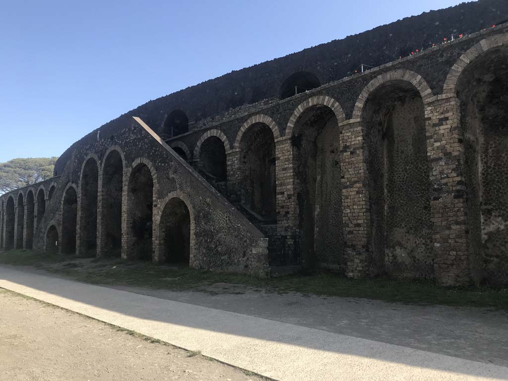 II.6 Pompeii. April 2019. Amphitheatre, central west side double staircase and new cement walkway.
Photo courtesy of Rick Bauer.