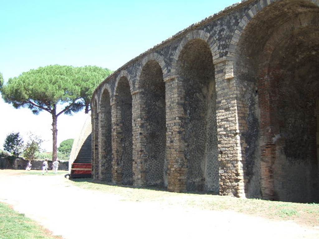 II.6 Pompeii. September 2005. Amphitheatre, looking north from near entrance corridor, on right.