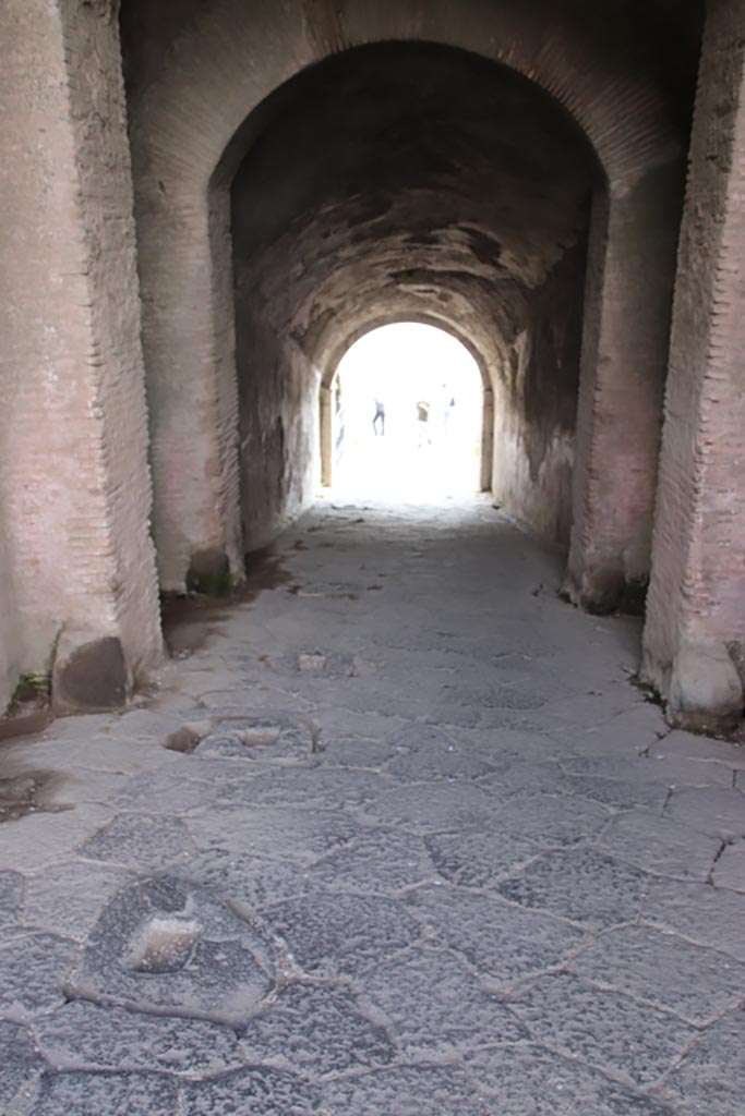 II.6 Pompeii. October 2022.
Looking south down sloping corridor towards arena. Photo courtesy of Klaus Heese