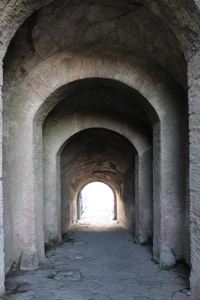 II.6 Pompeii. December 2018.
Looking south down sloping corridor towards arena. Photo courtesy of Aude Durand.
