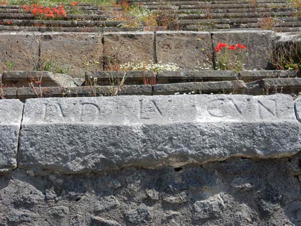 II.6 Pompeii. May 2016. Inscription carved on rim of inner wall of the arena of the Amphitheatre.
Inscription LVD LV CVN, part of CIL X 854. Photo courtesy of Buzz Ferebee.