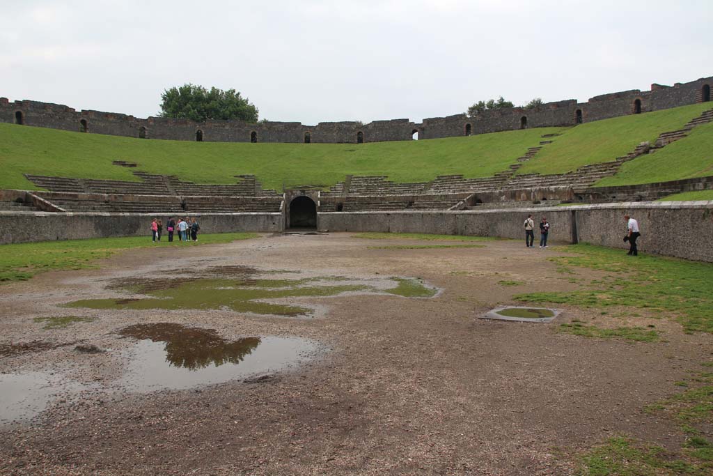 II.6 Pompeii. April 2014. Looking south across arena and seating of amphitheatre.
Photo courtesy of Klaus Heese.
