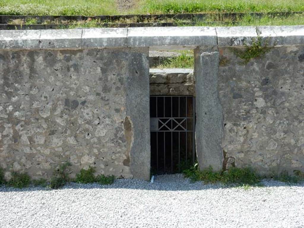 II.6 Pompeii. May 2016. Arena, west side.
Showing doorway to tunnel leading from arena floor to outside the Amphitheatre.
According to Mau, this would have been the corridor for removing the bodies of the dead.
Photo courtesy of Buzz Ferebee.