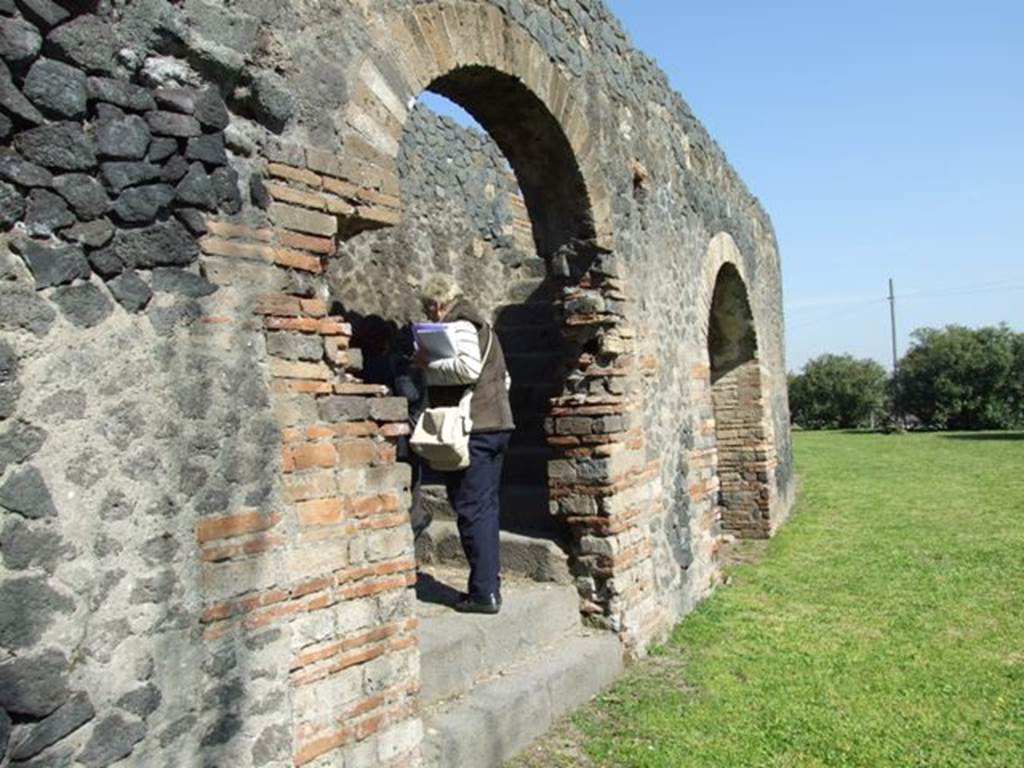 II.6 Pompeii. March 2009. Double stairways to upper level from terrace of the Amphitheatre.