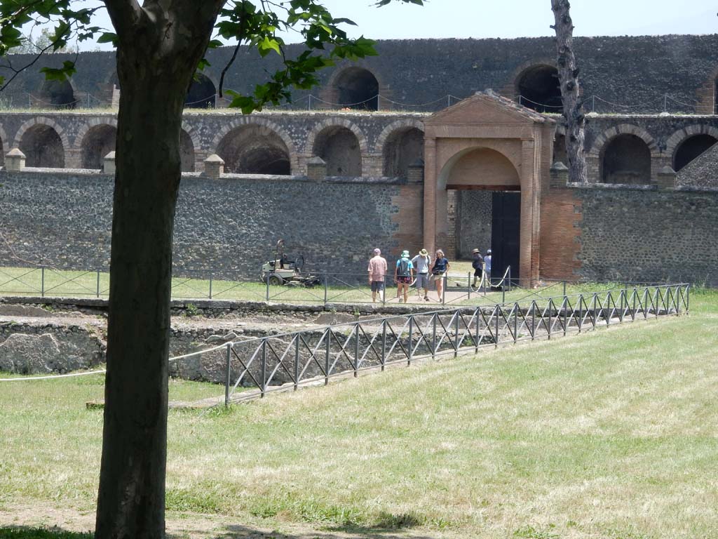 II.7 Pompeii. June 2019. Looking east towards entrance doorway at II.7.3, from south-west corner of pool.
Photo courtesy of Buzz Ferebee.