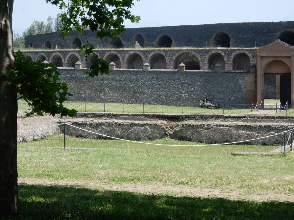 II.7 Pompeii. June 2019. North-east corner and east side of pool and doorway at II.7.3. Photo courtesy of Buzz Ferebee.