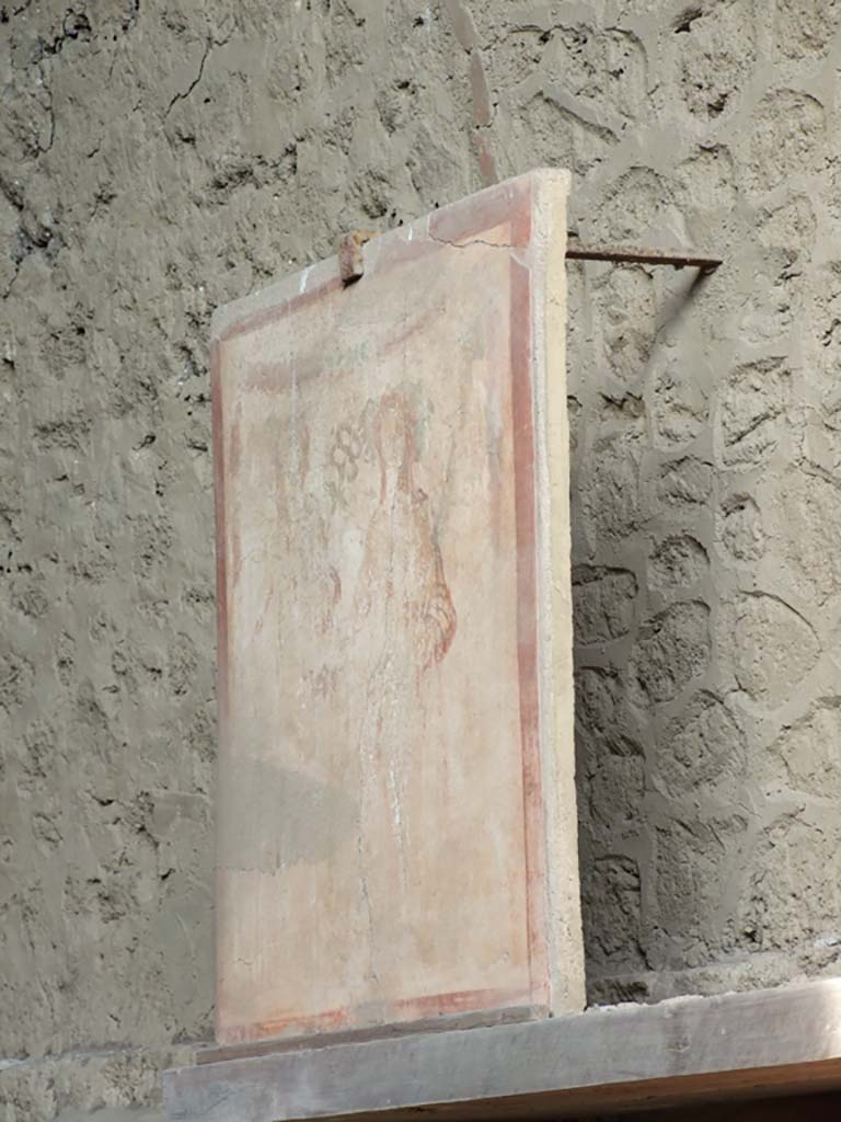 III.3.6 Pompeii. December 2007. Displayed on east wall - painting of Bacchus and Mercury.
Pilaster painting from south side of entrance façade of II.1.12 Complesso dei Riti magici.
See Fröhlich, T., 1991, Lararien und Fassadenbilder in den Vesuvstädten. Mainz: von Zabern. (F16: p. 312, T. 54/1).