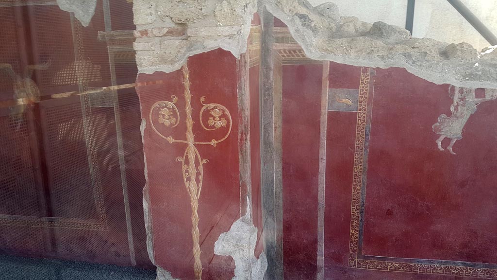 III.3.6 Pompeii. August 2023. Painted pillar at north end of east wall. Photo courtesy of Maribel Velasco.