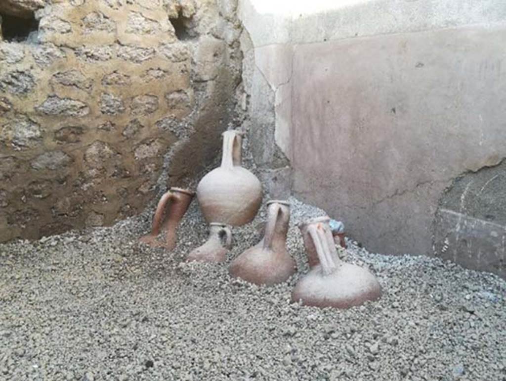 III.3.6 Pompeii. December 2017. Room in north-east corner with largely intact amphorae partly excavated.
