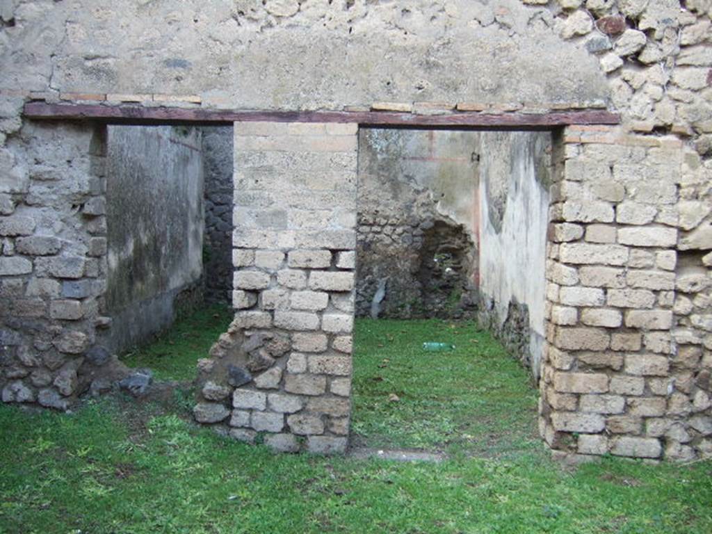 III.4.1 Pompeii. December 2005. Doorway and window in north wall.