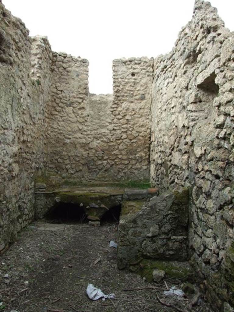 III.4.3  Pompeii.  March 2009. Room 6.  Kitchen and Latrine.  Looking north, with niche on east wall.