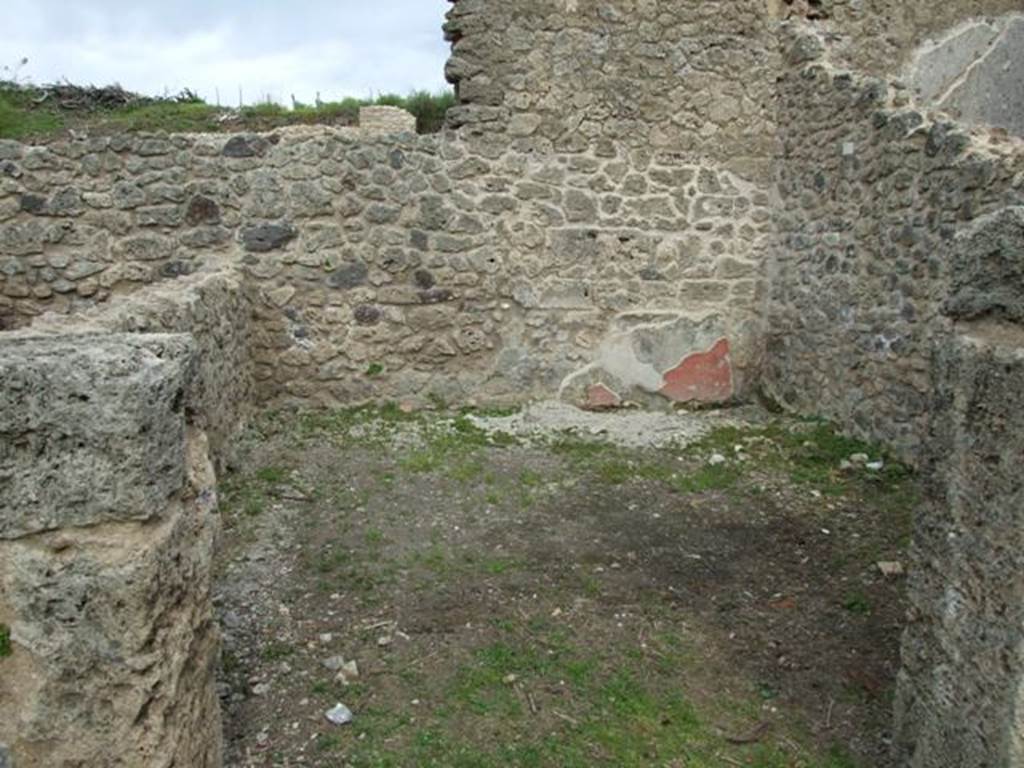 III.4.b. Pompeii. March 2009. Room 8, with small remains of original plaster. Looking east.