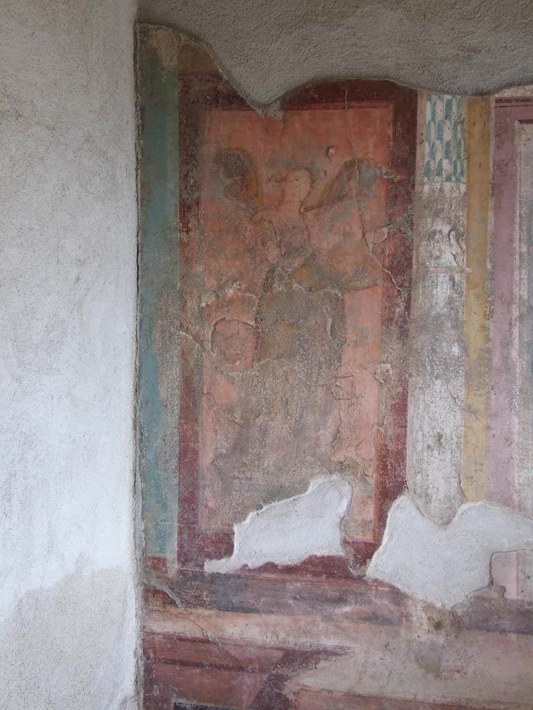 V.1.18 Pompeii. March 2009.
East wall of exedra “y”, at north end. Wall painting of a winged lyre player or muse.
See Leach, E.W., 2004. The Social Life of Painting in Ancient Rome and on the Bay of Naples. Cambridge UK: Cambridge UP. (p.135).