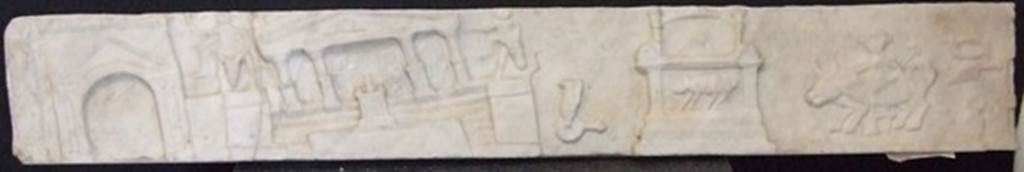 V.1.26 Pompeii. Marble slab from side of household altar in Atrium. The slab shows scenes of the Forum in the earthquake of AD62. SAP inventory number 20470.