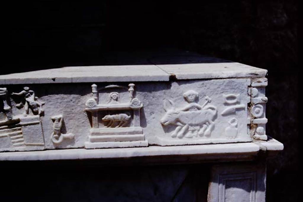 V.1.26 Pompeii. 1964. Part of scene on marble slab from side of household altar in atrium. Photo by Stanley A. Jashemski.
Source: The Wilhelmina and Stanley A. Jashemski archive in the University of Maryland Library, Special Collections (See collection page) and made available under the Creative Commons Attribution-Non Commercial License v.4. See Licence and use details.
J64f1633