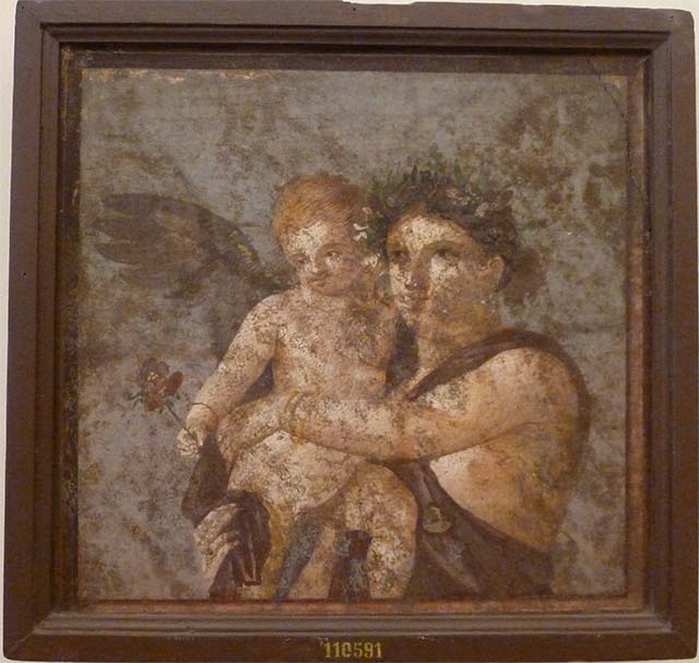V.1.26 Pompeii. May 2010. Painting of a Maenad carrying a cupid.
Found in the tablinum, on the right of the Iphigenia painting, that is the east end of north wall.
Now in Naples Archaeological Museum. Inventory number 110591.
