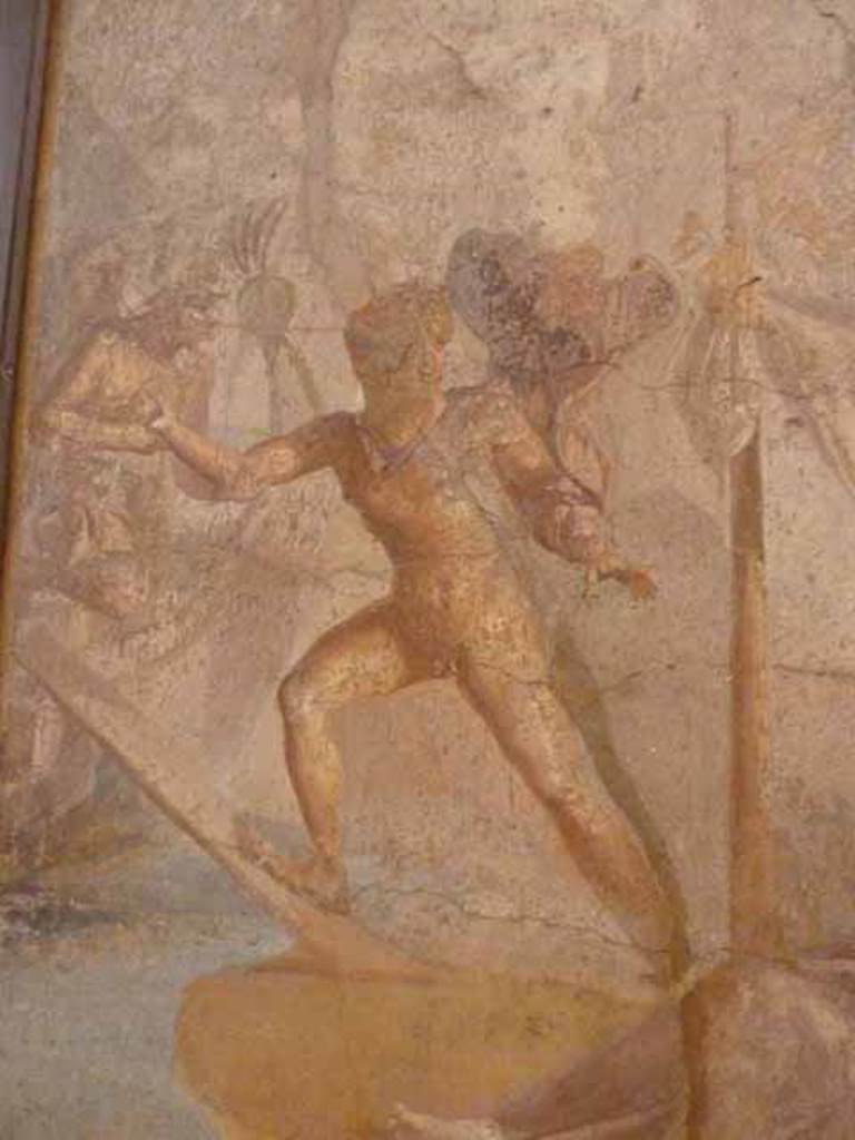 V.1.26 Pompeii. May 2010. Room “o”, east wall of triclinium.
Detail of Theseus moving towards his ship, abandoning the sleeping Ariadne on the island of Naxos.
Now in Naples Archaeological Museum. Inventory number 115396.