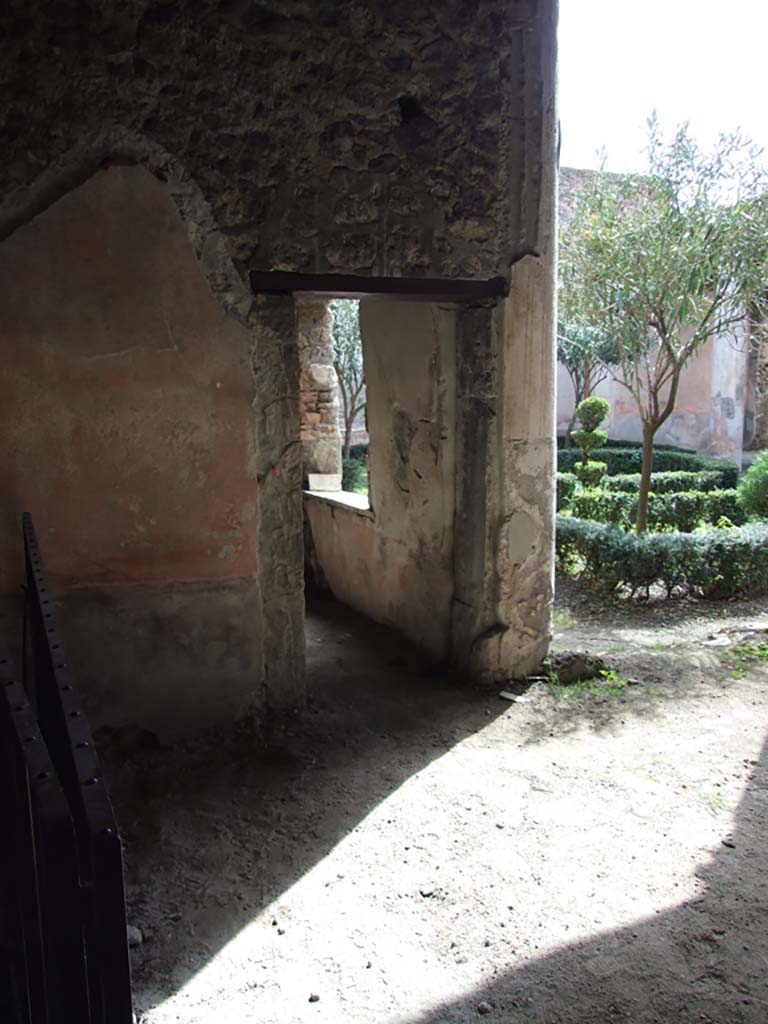 V.1.26 Pompeii. March 2009. 
Room 20, looking towards doorway to room on east side of peristyle garden. 
