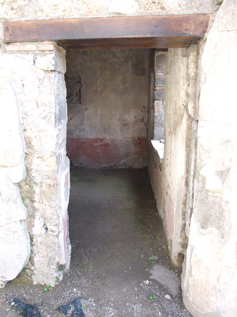 V.1.26 Pompeii. March 2009. Room “r”, looking south through doorway to room “t” in south-east corner of peristyle.