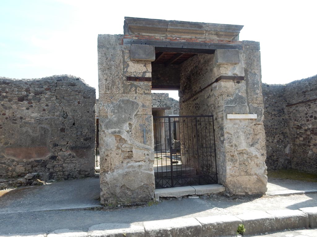 V.1.26 Pompeii. May 2015. Entrance doorway on east side of Via del Vesuvio. Photo courtesy of Buzz Ferebee.