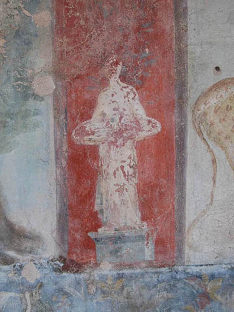 V.4.a Pompeii. May 2014. Painted garden statuette from north wall of garden area. Photo courtesy of Paula Lock.
