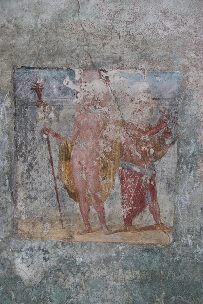 V.4.a Pompeii. October 2023.
Room ‘s’, east wall, wall painting of Dionysus (Bacchus) accompanied by Silenus playing the lyre.
Photo courtesy of Klaus Heese.