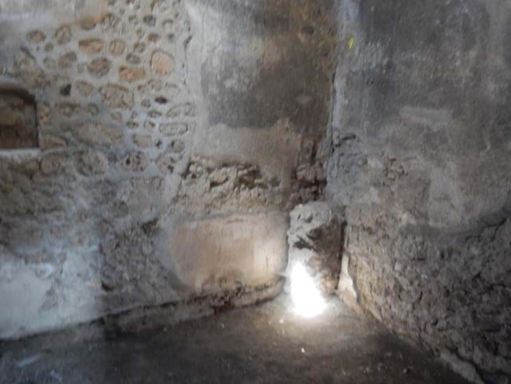 V.4.a Pompeii. May 2015.
Room ‘x’, looking towards north wall with small niche in north-west corner. Photo courtesy of Buzz Ferebee.