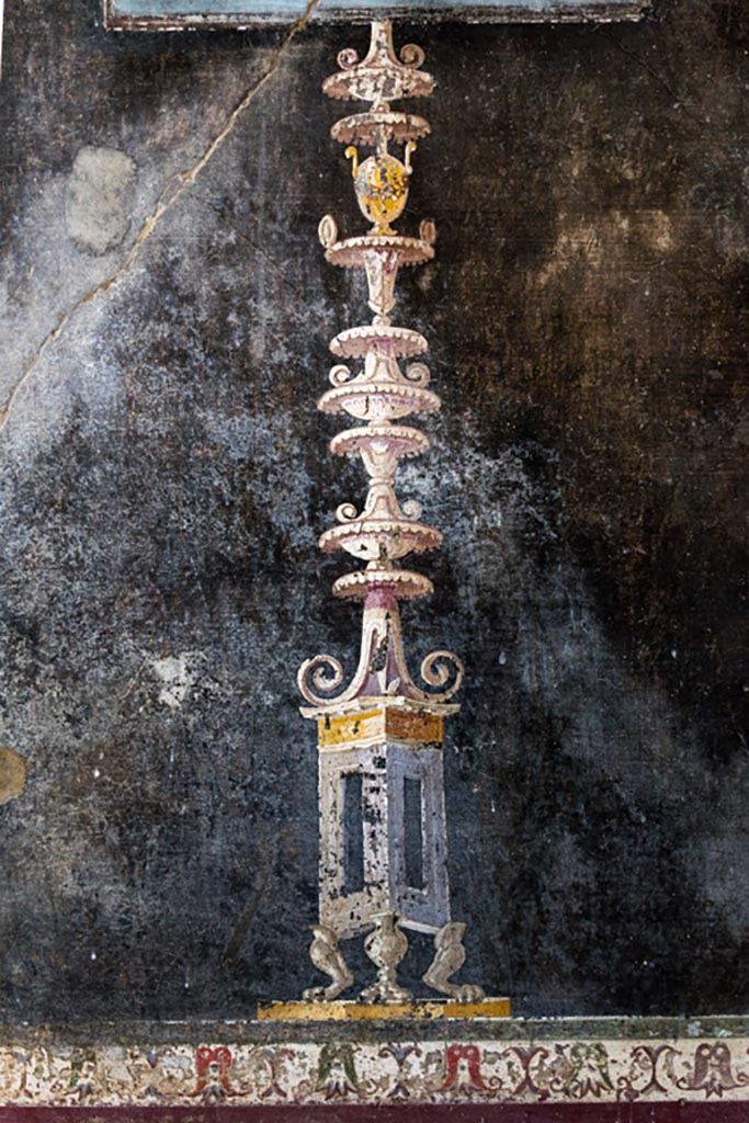 V.4.a Pompeii. January 2023.
Room ‘h’, painted decoration below small panel at west end of south wall.
Photo courtesy of Johannes Eber.