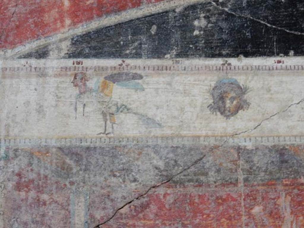V.4.a Pompeii. May 2015. Detail from upper centre of west wall of cubiculum.
Photo courtesy of Buzz Ferebee.