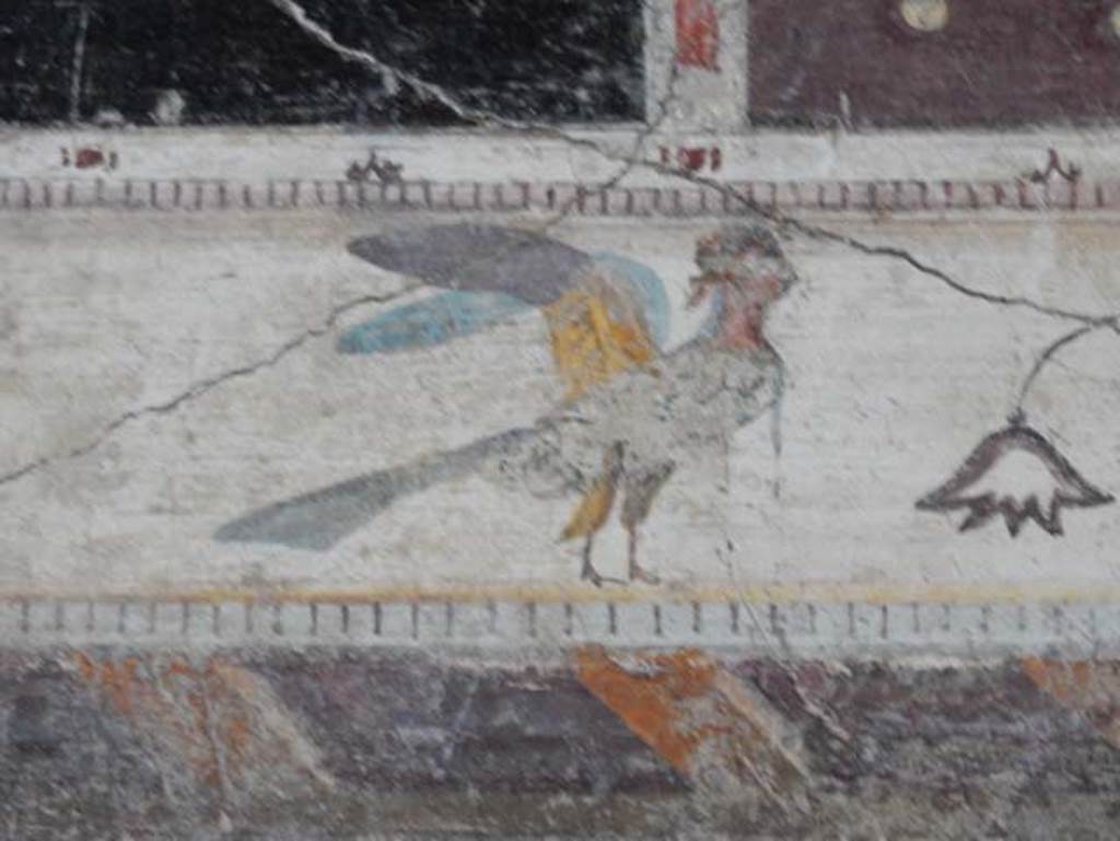 V.4.a Pompeii. May 2015. Detail from upper centre of west wall of cubiculum.
Photo courtesy of Buzz Ferebee.