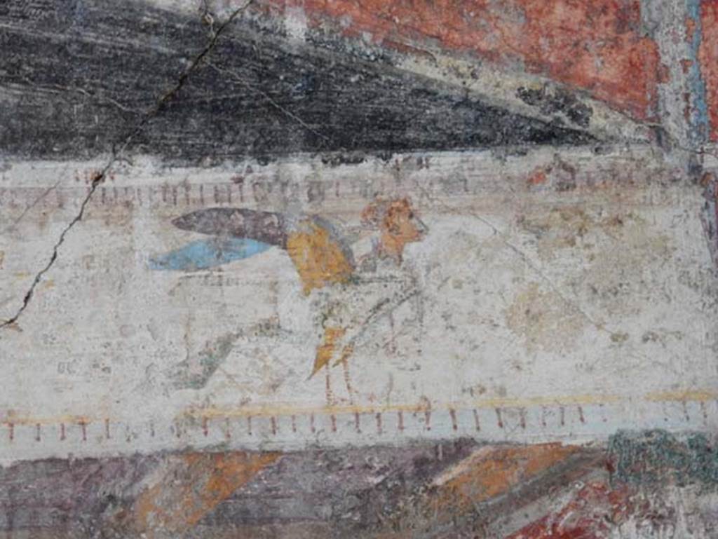 V.4.a Pompeii. May 2015. Detail from upper centre of west wall of cubiculum.
Photo courtesy of Buzz Ferebee.