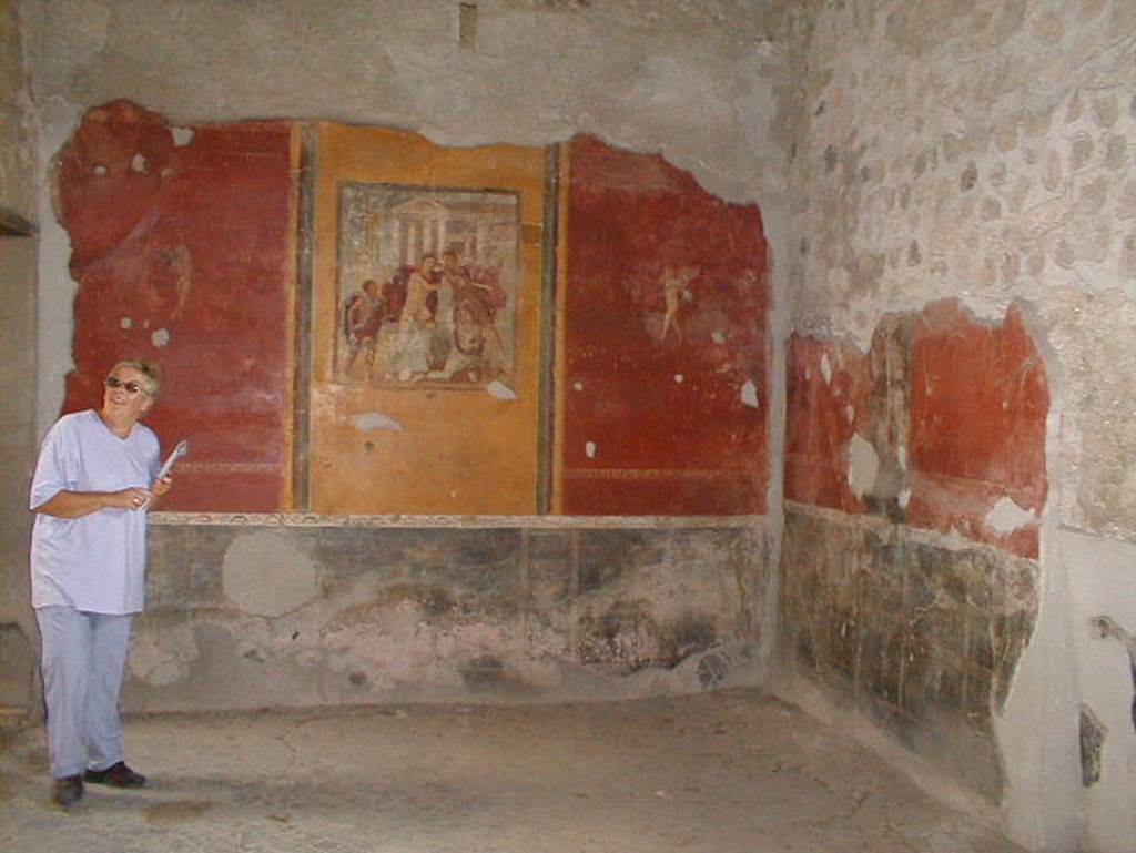 V.4.a Pompeii. September 2004. Winter triclinium, looking east.