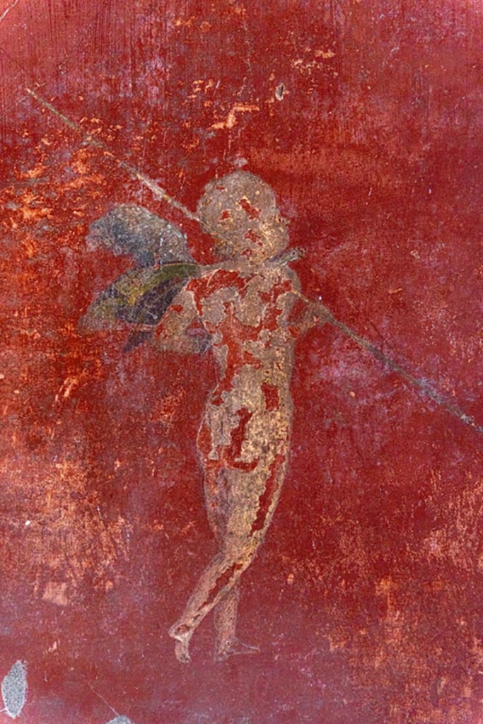 V.4.a Pompeii. October 2023.
Room ‘f’, detail of painted figure from panel at north end of east wall. Photo courtesy of Johannes Eber.