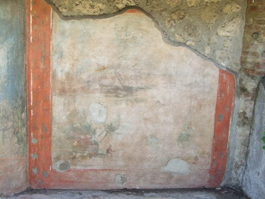 V.5.3 Pompeii. March 2009.  Room 7, north-west corner on west side of peristyle.  Painting 4 – Remains of landscape painting of Daedalus and Icarus. A small fisherman can be seen at the lower left of the painting, nothing much else remains.
