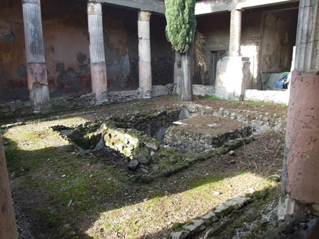 VI.1.7 House of the Vestals. Looking north west across pool in room 13, the peristyle.