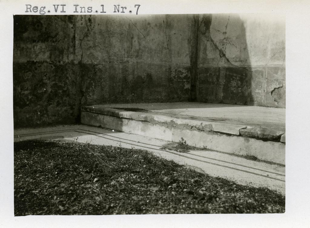 VI.1.7 Pompeii. Pre-1937-39.
Looking towards north-west corner and white mosaic flooring in main room with a two-line border in black, and step to alcove/recess.
Photo courtesy of American Academy in Rome, Photographic Archive. Warsher collection no. 1400.