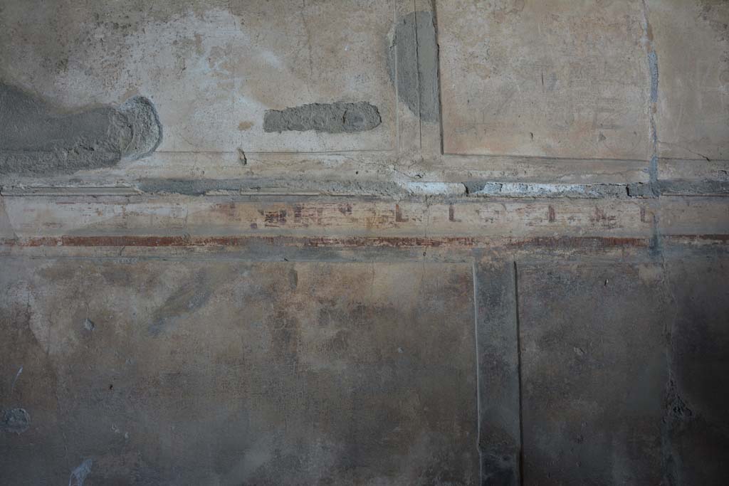 VI.2.4 Pompeii. March 2019. North wall of oecus, with remaining painted decoration above zoccolo.
Foto Annette Haug, ERC Grant 681269 DCOR.
