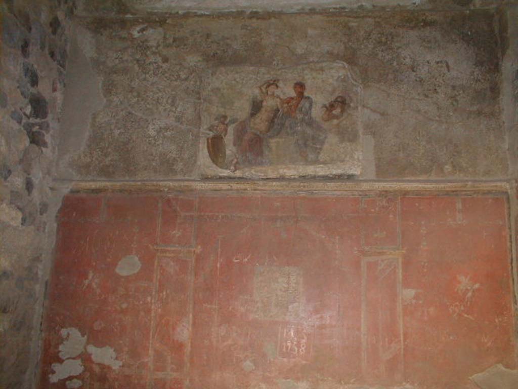VI.2.4 Pompeii. September 2004. Cubiculum in the south-west corner of small garden with wall painting of Ares and Aphrodite on south wall.
Mau stated: On the outer walls of the 2 sleeping rooms, in the south Garden, ………room on the right on the rear inner wall - two pairs of lovers, Paris and Helen in the House of Menelaus, and Aries and Aphrodite.
See Mau, A., 1907, translated by Kelsey F. W. Pompeii: Its Life and Art. New York: Macmillan. (p.283-7).
Helbig stated: 2nd peristyle on the south side of the house, room to the right behind this peristyle, Paris & Elena, 1311, above that – Aphrodite and Aries 319.
See Helbig, W., 1868. Wandgemälde der vom Vesuv verschütteten Städte Campaniens. Leipzig: Breitkopf und Härtel. (1311, 319).