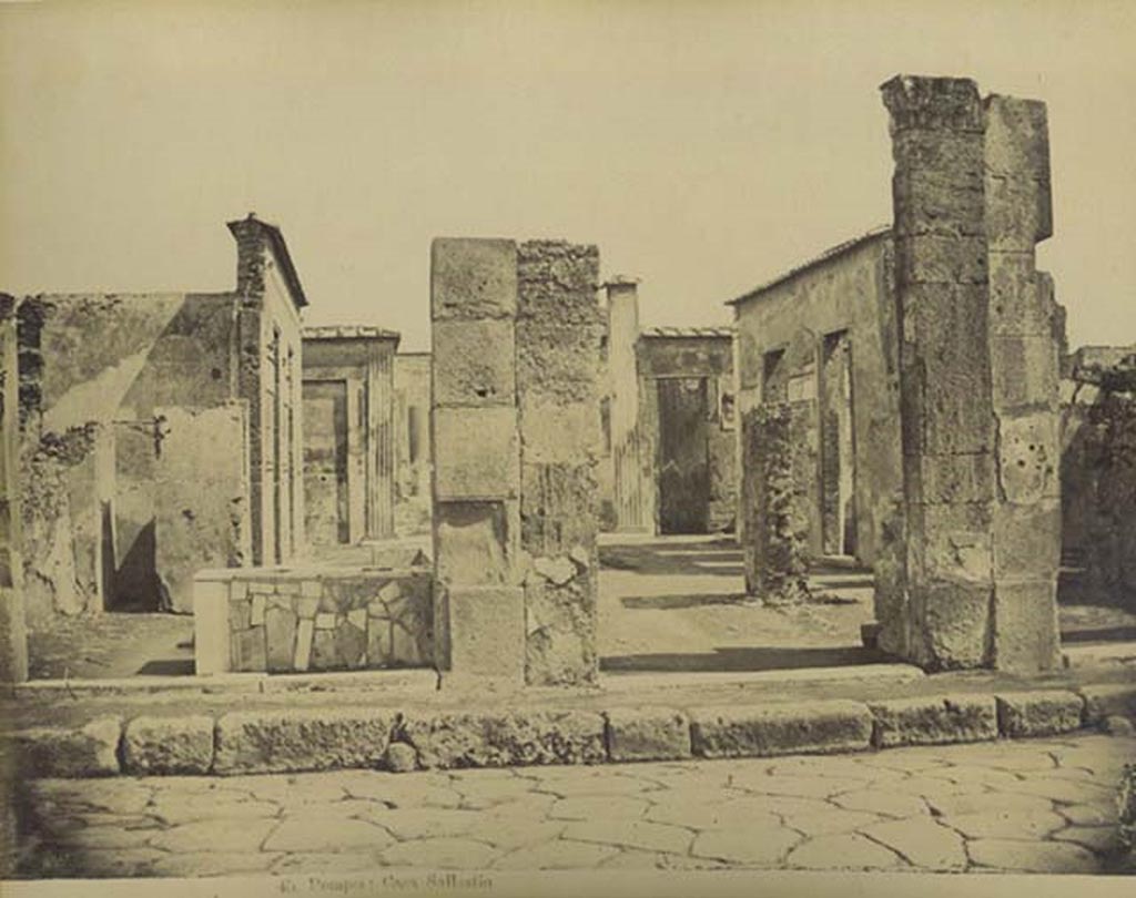 VI.2.4 Pompeii. Pre-1873, photograph Edizione Esposito, no. 45. Looking towards entrances, and into atrium. Photo courtesy of Rick Bauer.
According to Laidlaw and others –
“A photograph of Michele Amodio of c.1873, shows the sculptured capital still in place (in photographs made only a few years later it had disappeared)”, (p.47).
“For the house of Sallust, Brogi, Amodio, Sommer, Anderson, Alinari and others sold a standard group of views, photographs of the façade, the atrium, the thermopolium next to it, the bakery, and the painting of Actaeon.” (p.45).
See Laidlaw, A., and Stella M. S., 2014. The House of Sallust in Pompeii (VI.2.4): JRA 98. Portsmouth Rhode Island. (p.45 and p.47).
