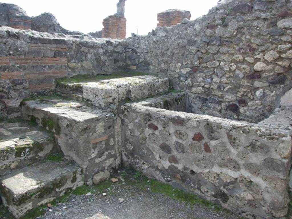 VI.3.3 Pompeii. March 2009. Room 8, South west corner. Stairs to upper floor and water trough.