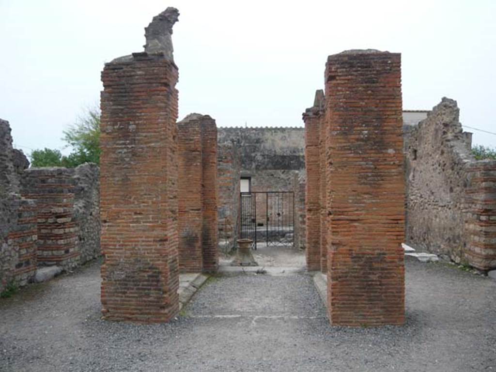 VI.3.3 Pompeii. May 2012. Looking west across impluvium towards entrance doorway.
Photo courtesy of Buzz Ferebee.