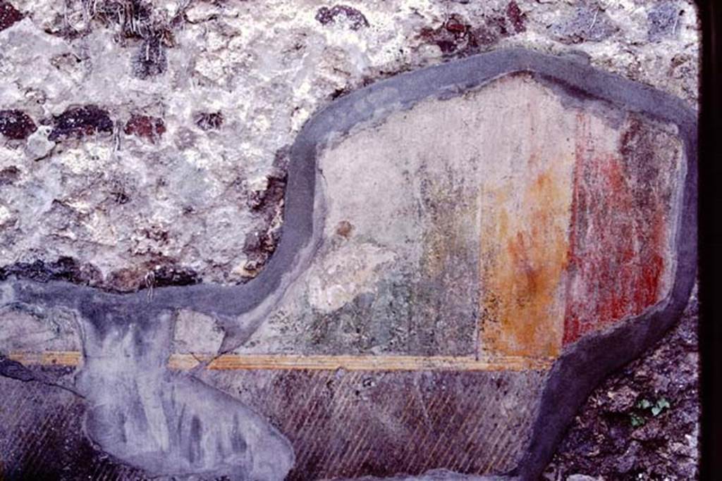 VI.7.23 Pompeii, 1983. West end of south wall behind pyramidal fountain, the remains of the painted plaster, as can be seen in the photo above, centre right.
Source: The Wilhelmina and Stanley A. Jashemski archive in the University of Maryland Library, Special Collections (See collection page) and made available under the Creative Commons Attribution-Non Commercial License v.4. See Licence and use details. J80f0550