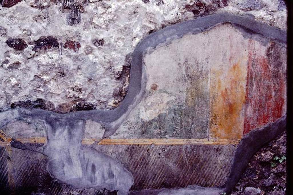 VI.7.23 Pompeii, 1983. Detail of remaining coloured painted plaster and trellis, from west side of south wall behind fountain.
Source: The Wilhelmina and Stanley A. Jashemski archive in the University of Maryland Library, Special Collections (See collection page) and made available under the Creative Commons Attribution-Non Commercial License v.4. See Licence and use details.
J80f0551