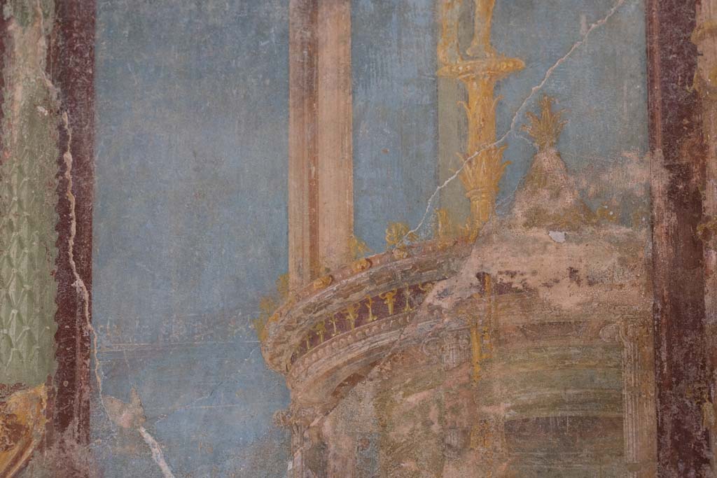 VI.8.3/5 Pompeii. April 2022. 
Room 12, detail from lower architectural panel on south side of central painting on east wall. Photo courtesy of Johannes Eber.
