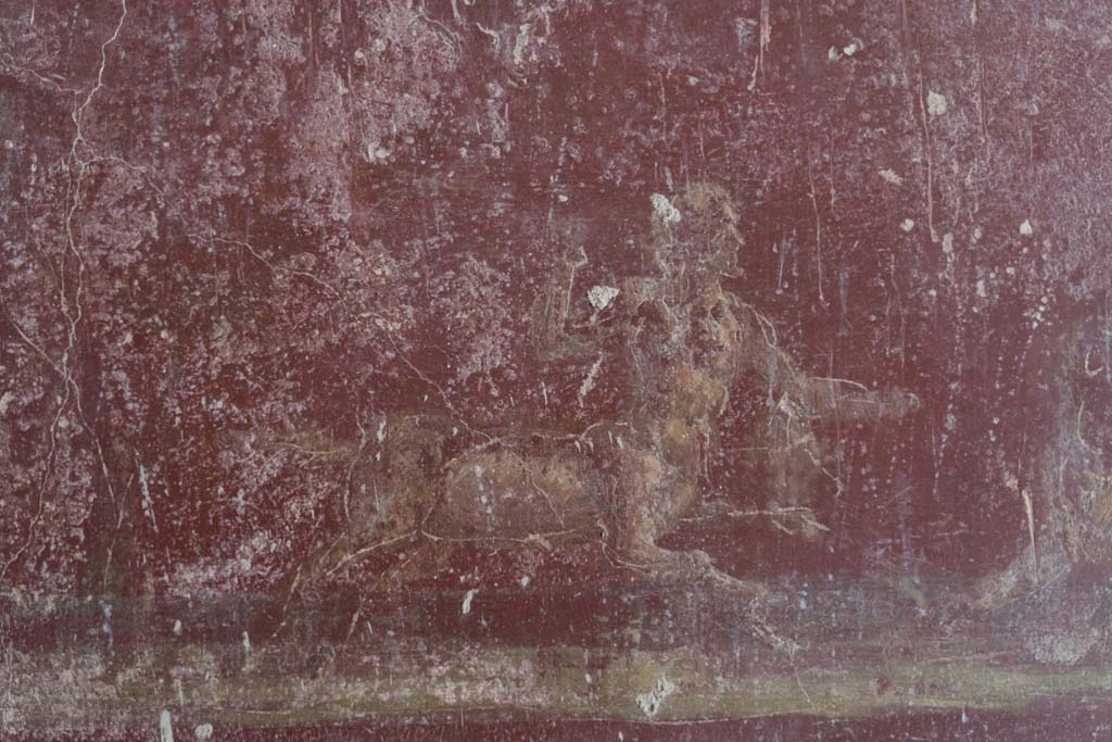 VI.8.3/5 Pompeii. April 2022. 
Room 12, detail of part of hunt scene with centaurs and a lion, from red predella below central panel on south wall.
Photo courtesy of Johannes Eber.

