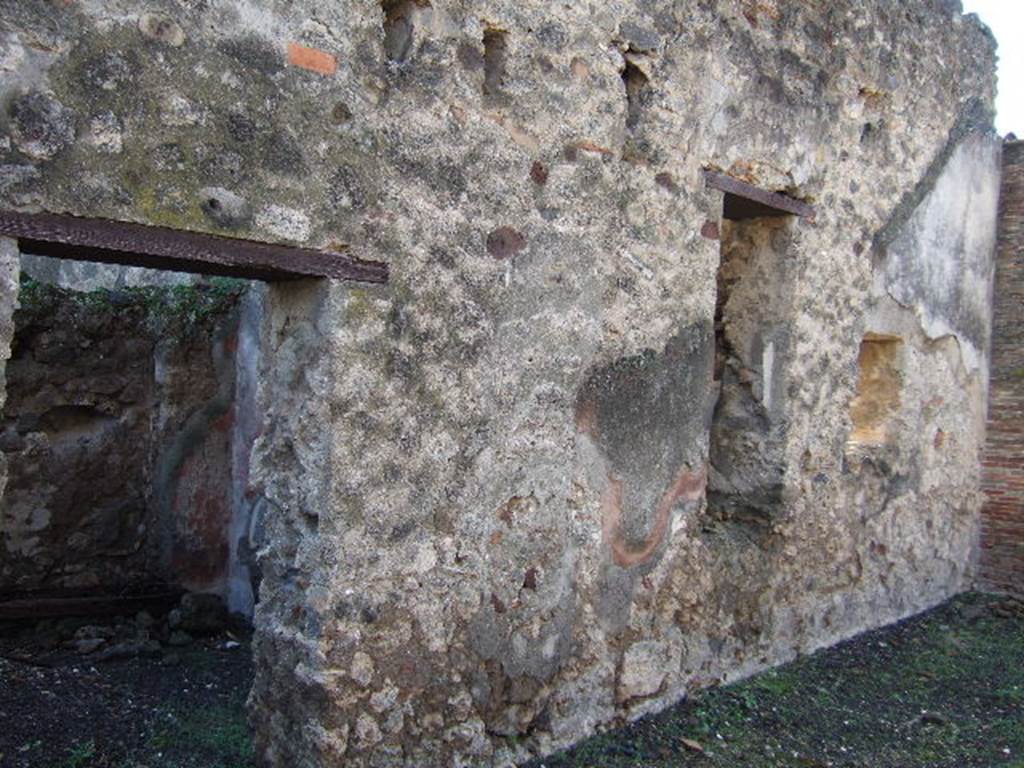 VI.8.20 Pompeii. December 2005. Room 1, looking west along south wall of entrance corridor. 
