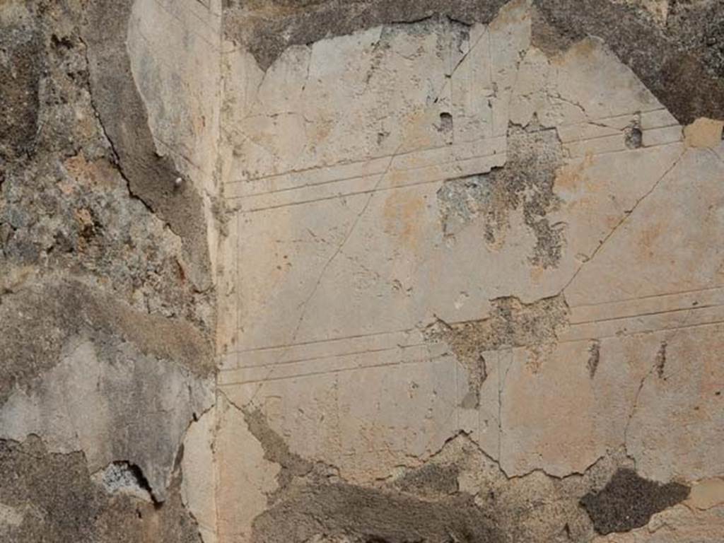 VI.8.22 Pompeii. May 2017. Room 18, detail from west end of north wall. Photo courtesy of Buzz Ferebee.